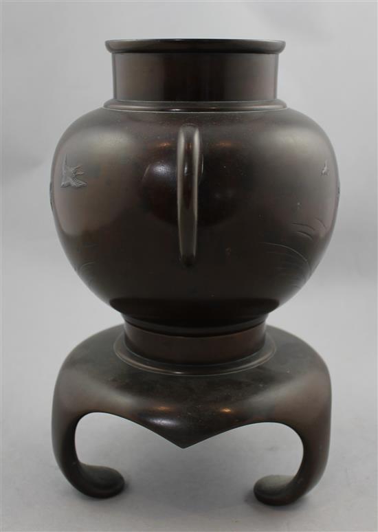 A Japanese inlaid bronze two handled vase and stand, Meiji period, 26cm